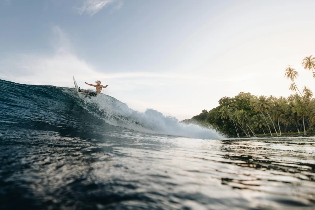 Surfing experience in Bali showcasing an island lifestyle getaway
